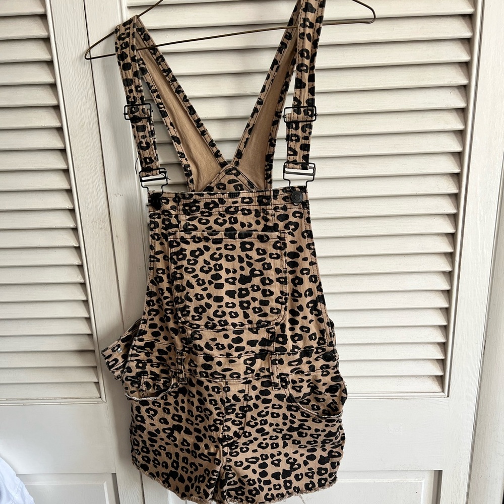 Cheetah print over alls